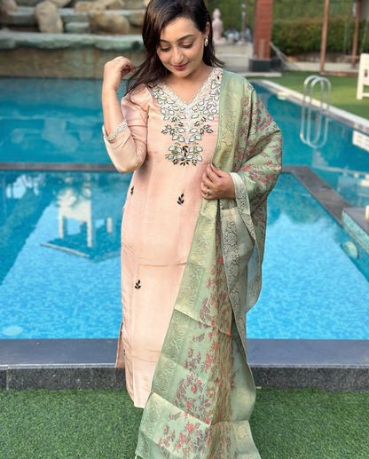 Vibrant floral embroidery with a coordinating floral dupatta.
