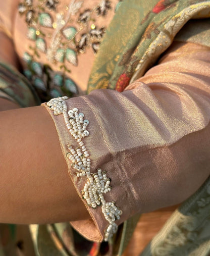 Vibrant floral embroidery with a coordinating floral dupatta.