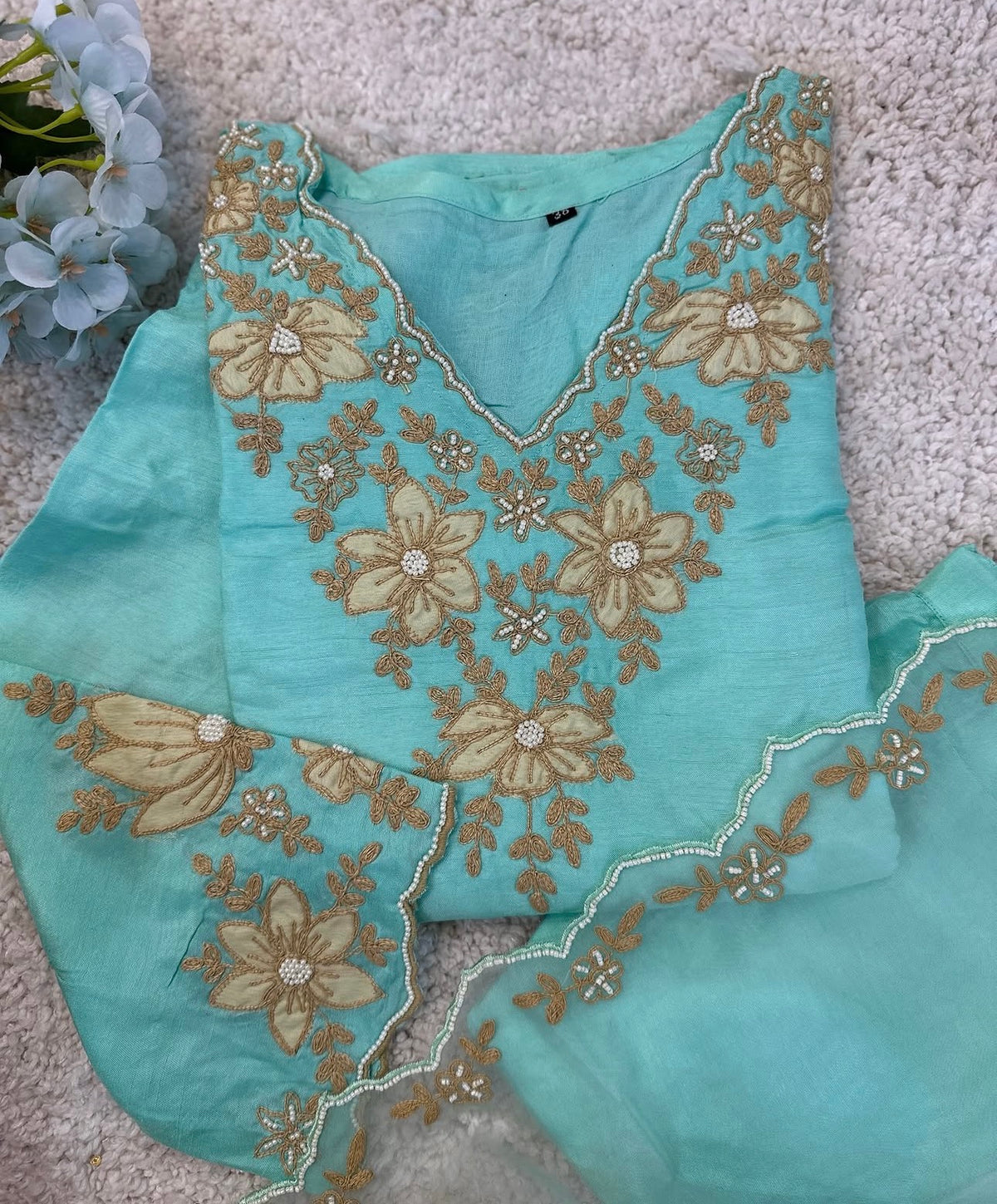 Beautiful Dola silk kurta, adorned with elegant ribbon embroidery