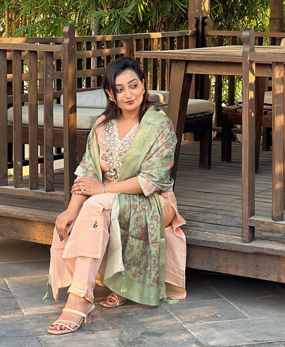 Vibrant floral embroidery with a coordinating floral dupatta.