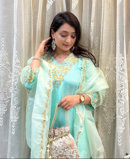 Beautiful Dola silk kurta, adorned with elegant ribbon embroidery