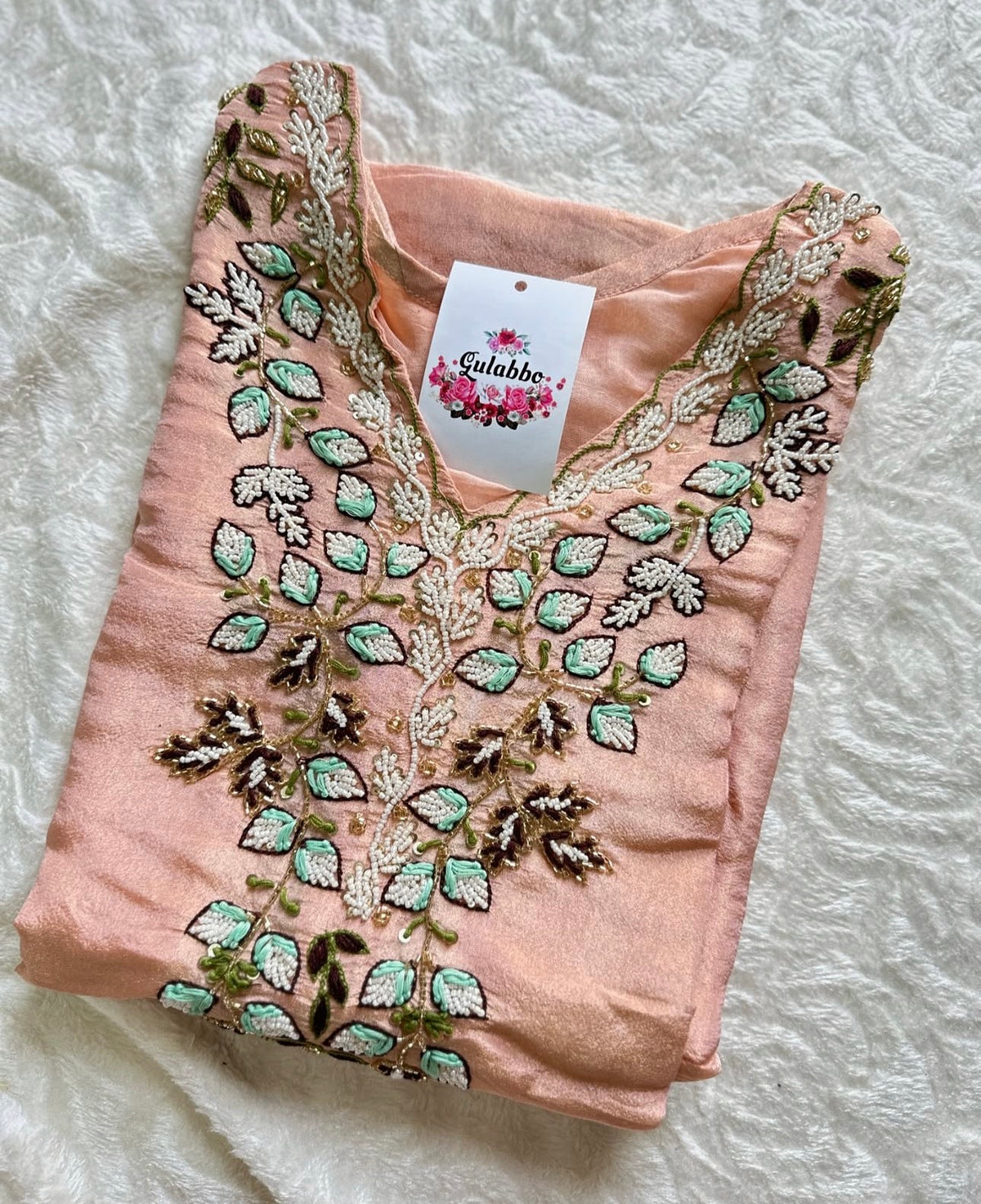 Vibrant floral embroidery with a coordinating floral dupatta.