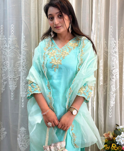Beautiful Dola silk kurta, adorned with elegant ribbon embroidery