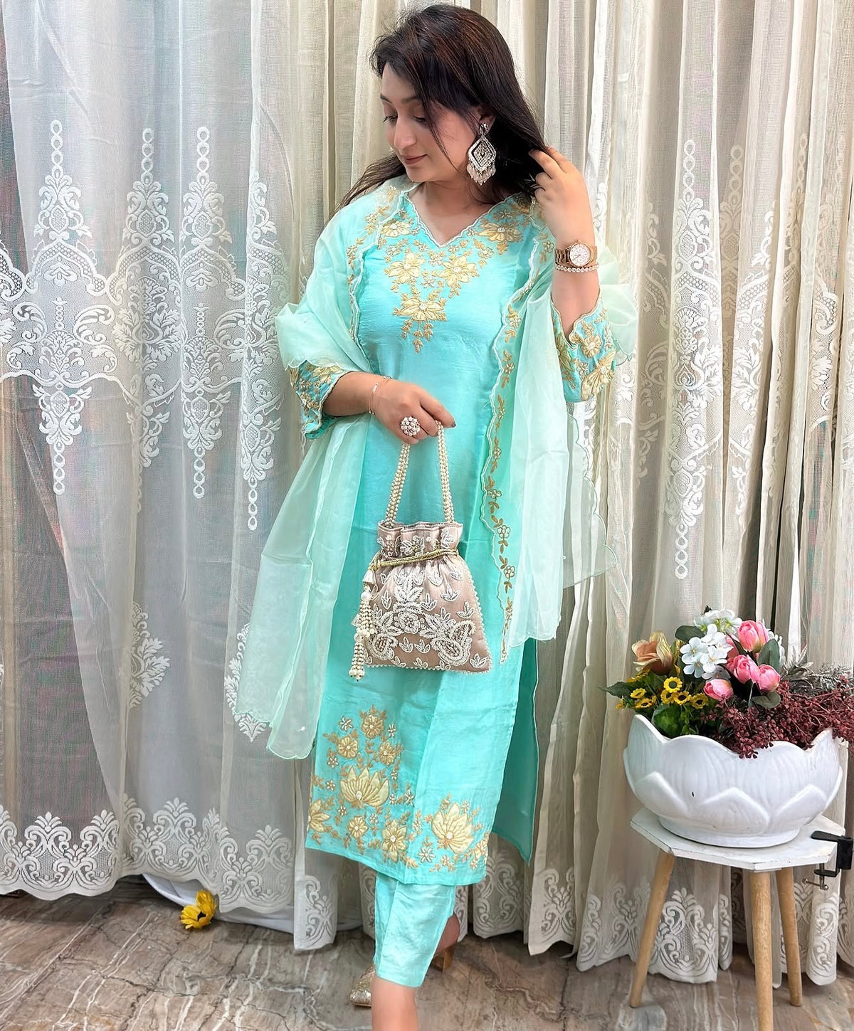 Beautiful Dola silk kurta, adorned with elegant ribbon embroidery